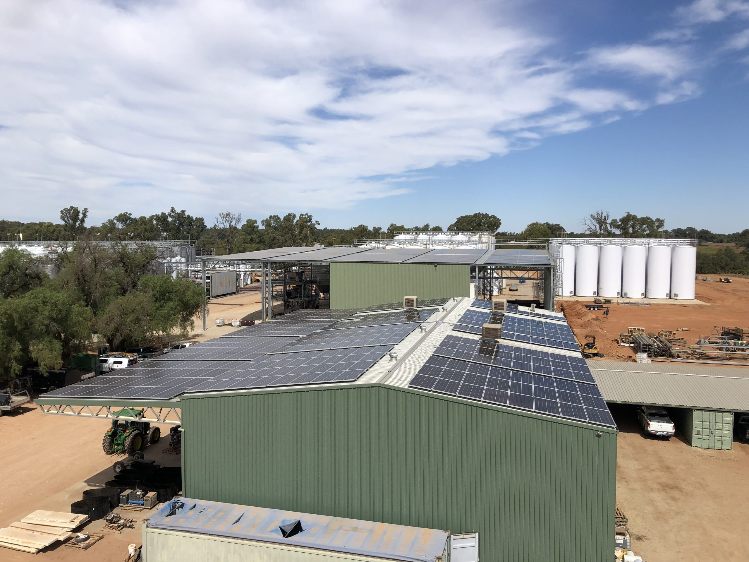 Solar panels on green tin roof